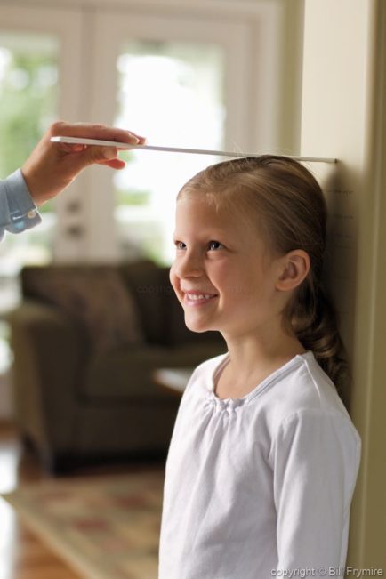 Parent Measuring Child