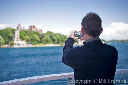 Touist taking photo of attraction
