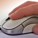 hand on computer mouse